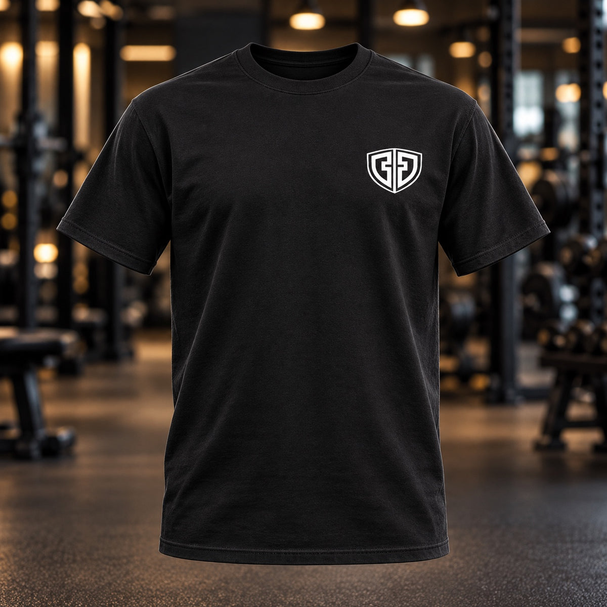 Front of the black Wake Up Worship Workout tee with small white DDA shield on the left chest